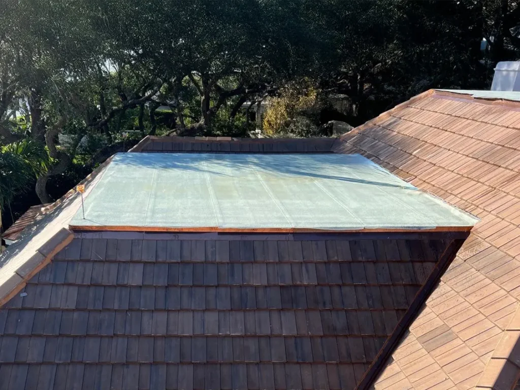 Composite Tile Roofing w/ Copper Flashing in Vero Beach Installed by Orchid Island Roofing